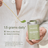 LANG:EN|Moringa powder being scooped from a tin, with a guide recommending 0.5 tsp daily, preferably in the morning with meals.