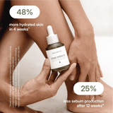 LANG:EN|Hands holding Treelogy Moringa Oil bottle with clinical results: 48% more hydrated skin in 4 weeks and 25% reduced oil in 12 weeks.