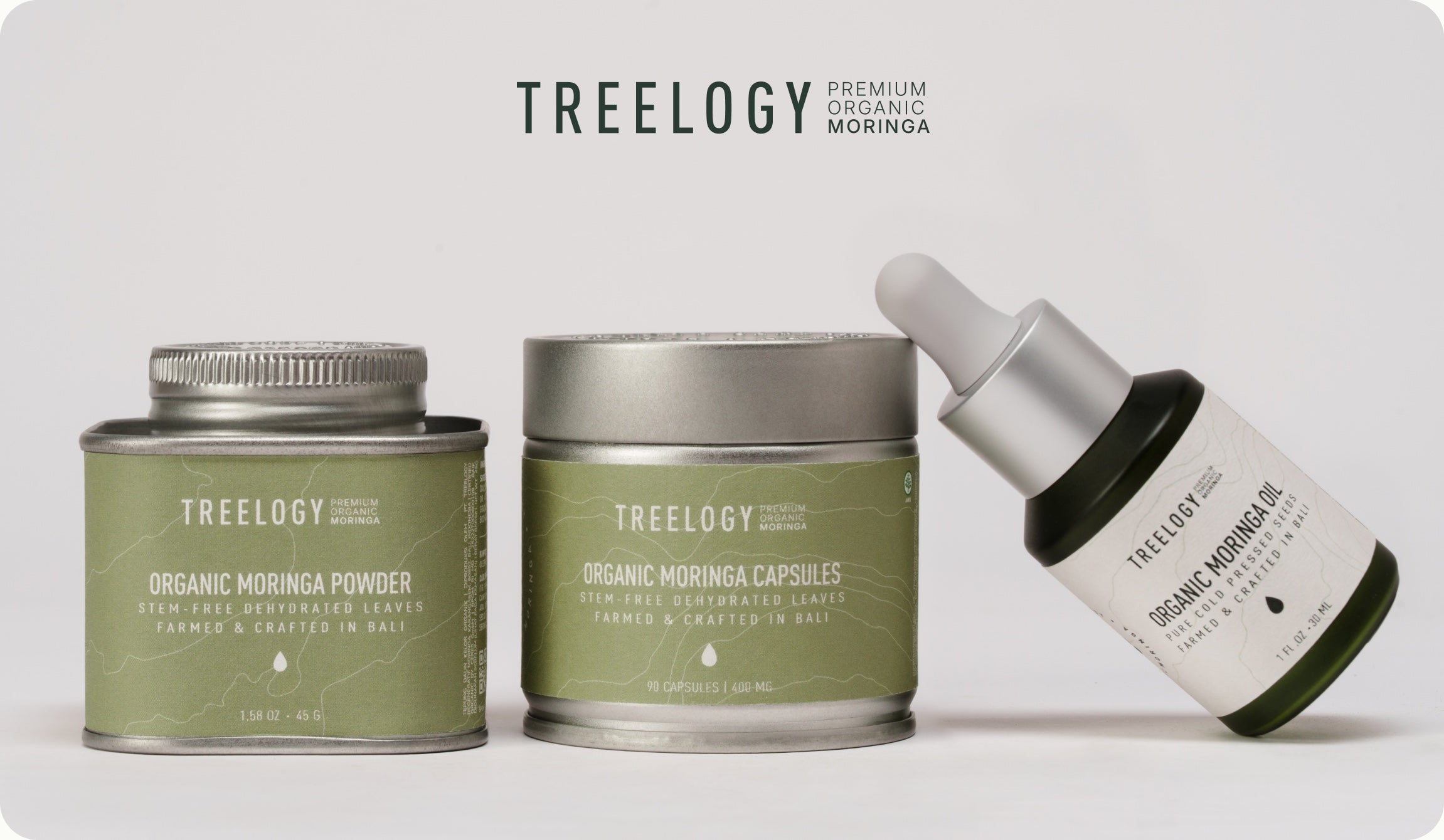 Moringa powder, kapsul, dan minyak Treelogy berjajar